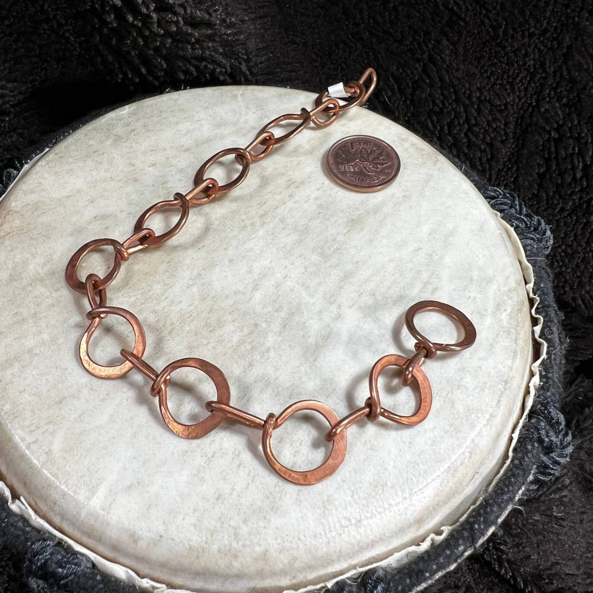Minimalist copper link bracelet with round hammered circle design