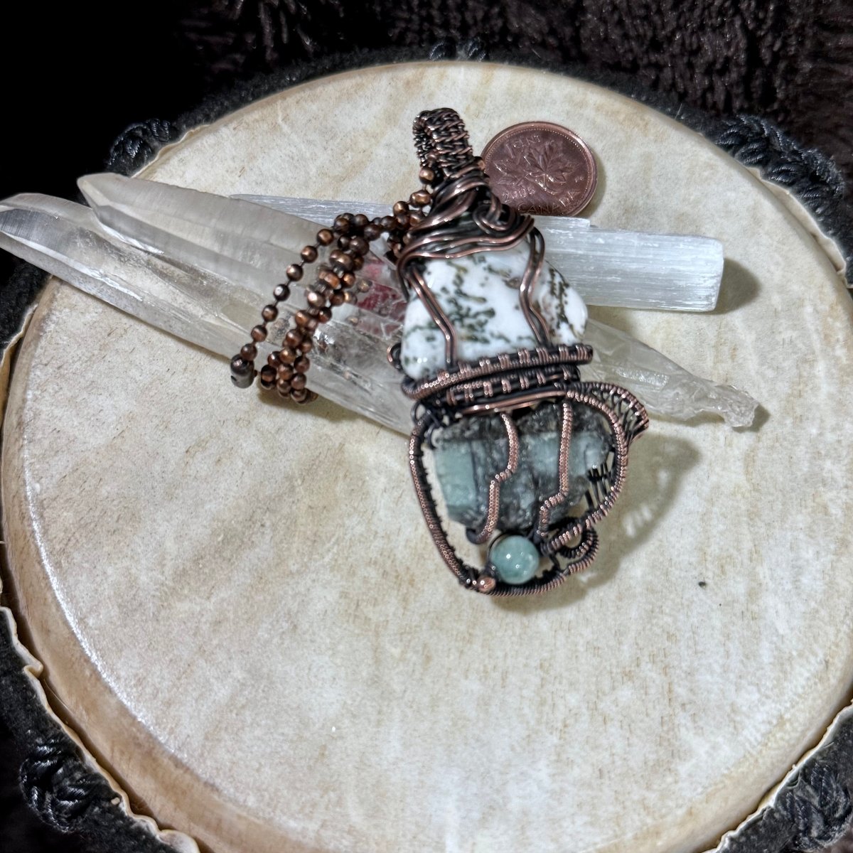Reverse of the Moss Agate and raw Emerald necklace showing the stones’ natural surfaces, Green Aventurine bead and root-like copper framework.