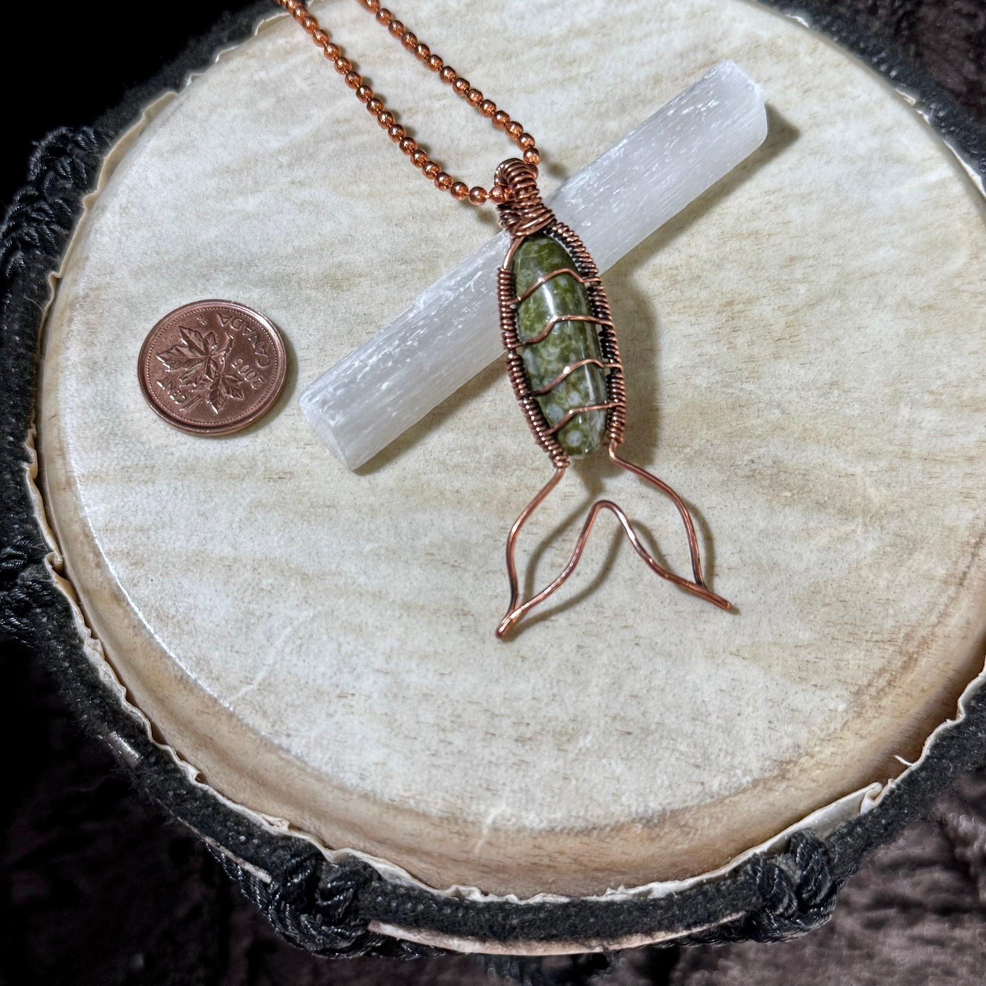 Handmade Bay of Fundy Green Epidote Mermaid Tail Necklace wrapped in reclaimed copper, featuring a natural green gemstone inspired by the rugged coastline of New Brunswick.