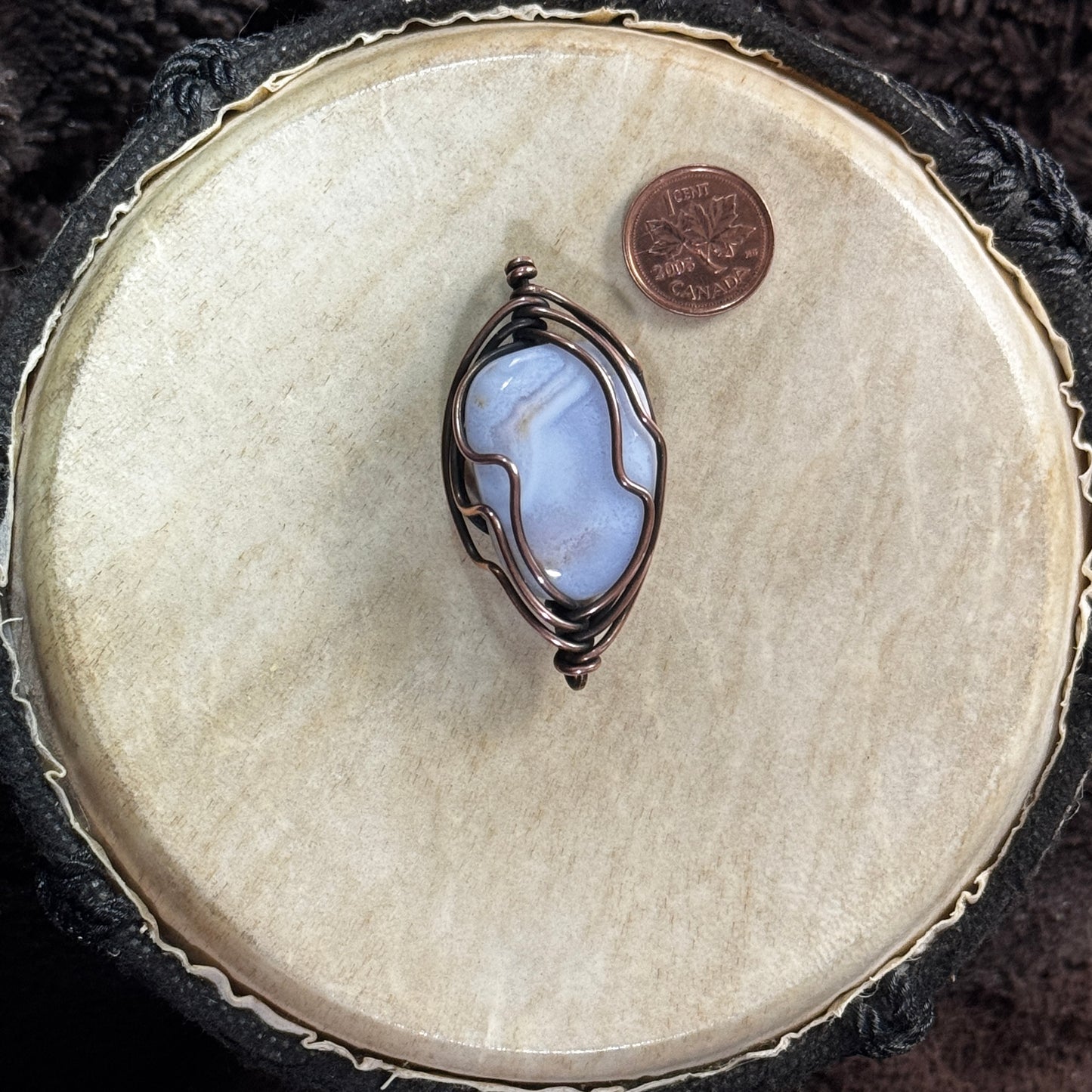 Polished blue lace agate pendant framed in a modified 16-gauge Herringbone copper weave, with double bails allowing two hanging directions.
