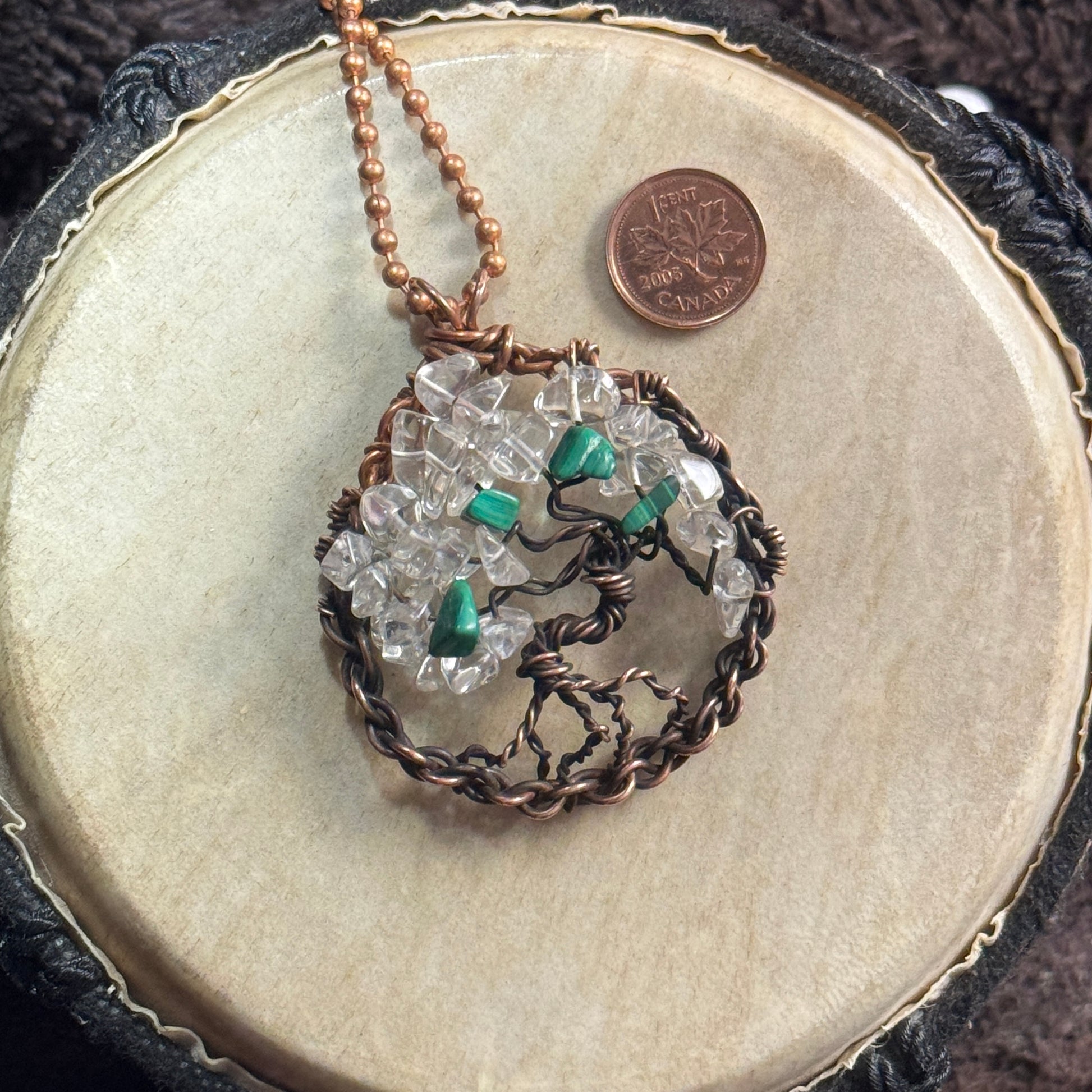 Two-inch Tree of Life necklace handmade from ombré-patinated reclaimed copper, icy clear quartz and green malachite gemstone chips.