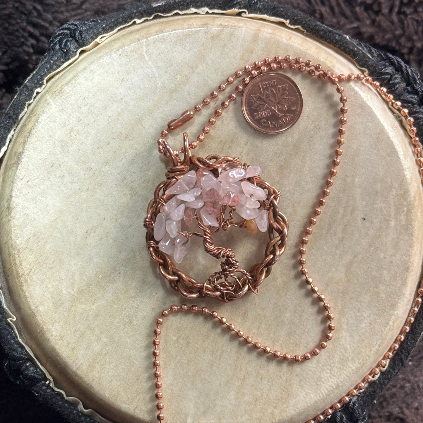 Rose quartz Tree of Life necklace handmade from reclaimed copper, with a 1.75-inch pendant and 20-inch faceted copper ball chain.