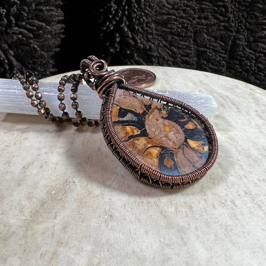 Ammonite fossil pendant wrapped in reclaimed copper wire, handmade Mother of Metal jewelry