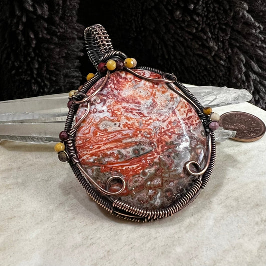 crazy lace agate pendant wrapped in darkened copper with red and cream swirling patterns and mookaite bead accents, handmade statement necklace