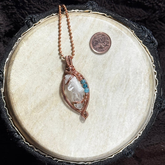 Front view of a handmade Lemurian crystal necklace in raw copper open weave with blue apatite bead accents on a 22 inch copper ball chain.