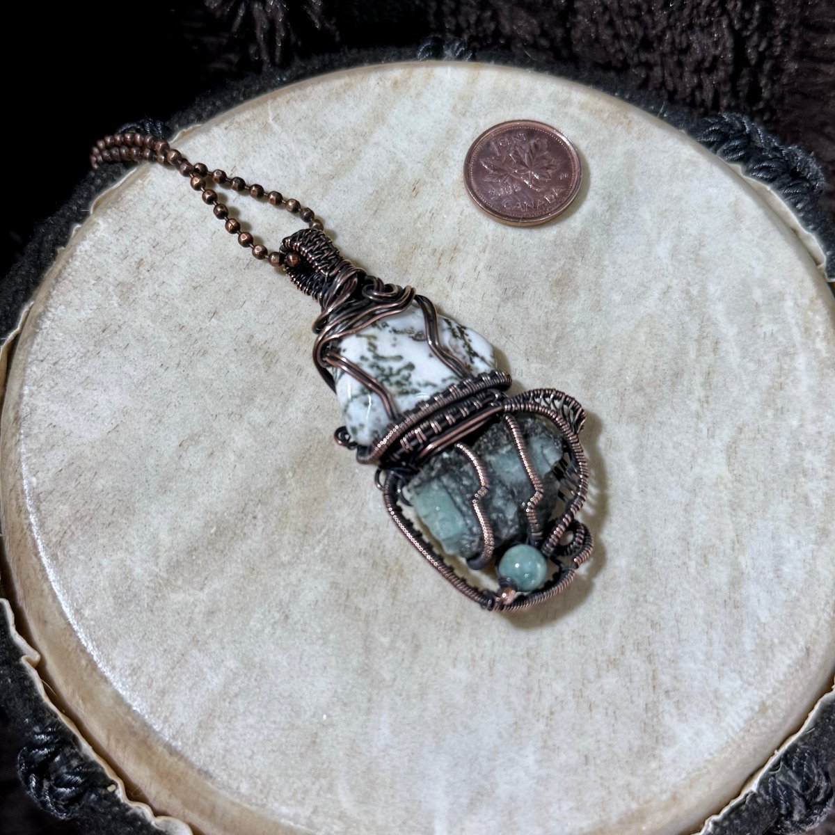 Detailed reverse view of the reversible Growthkeeper talisman with branching Moss Agate, rugged raw Emerald and Green Aventurine.
