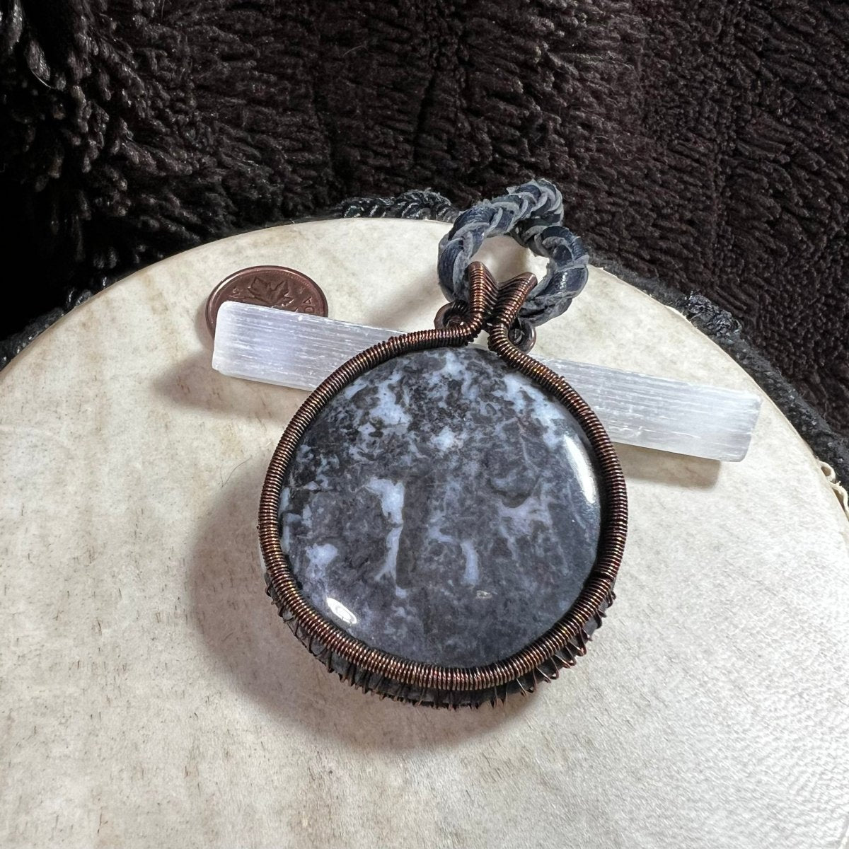 Large Zebra Stone cabochon pendant in woven reclaimed copper with braided leather cord.